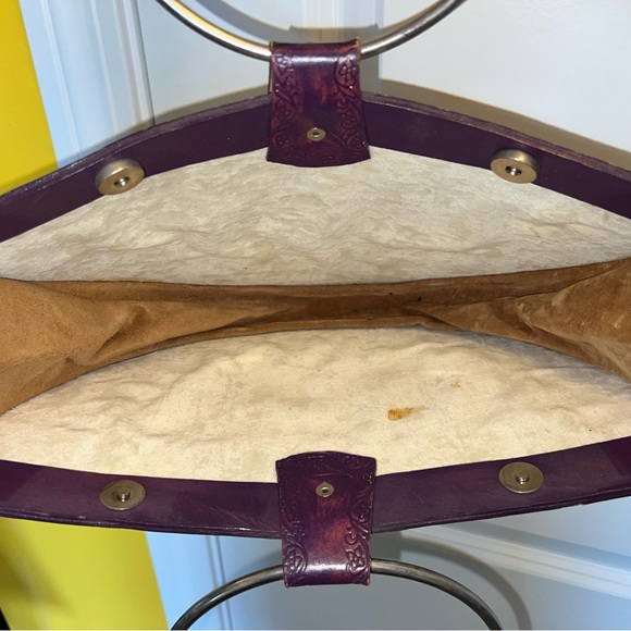 Handmade Leather stamped handbag with circular metal ring handles. - Picture 9 of 11